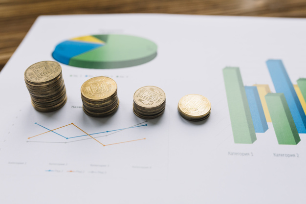 Close Up Of Stacked Coins On Graph Chart 23 2147892194